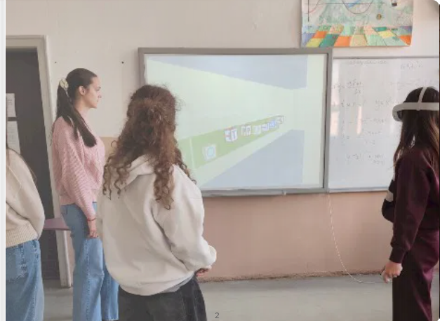 Students participating in a VR-supported learning activity with the virtual environment projected on the classroom board in North Macedonia